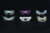 Fig 3. Six representative mandibular advancement devices. Top row, from left: TAP® appliance (tapintosleep.com), Somnodent (dorsal) appliance (somnomed.com), MicrO2™ appliance (microdental.com). Bottom row, from left: SUAD™ (Herbst) appliance (strongdental.com), Narval CC™ appliance (resmed.com) , and PM Positioner™ (adjustablepmpositioner.com). The Narval and MicrO2 appliances are computer-designed and manufactured by 3D printing and milling, respectively.
